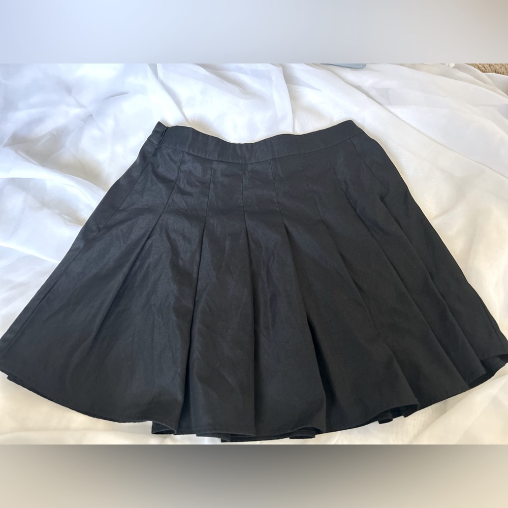 Black pleated tennis skirt.